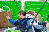 Children enjoy swinging