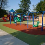 Swings at inclusive park in Amhertburg