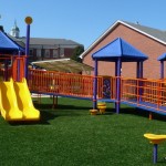 Ramp and slide on inclusive playground